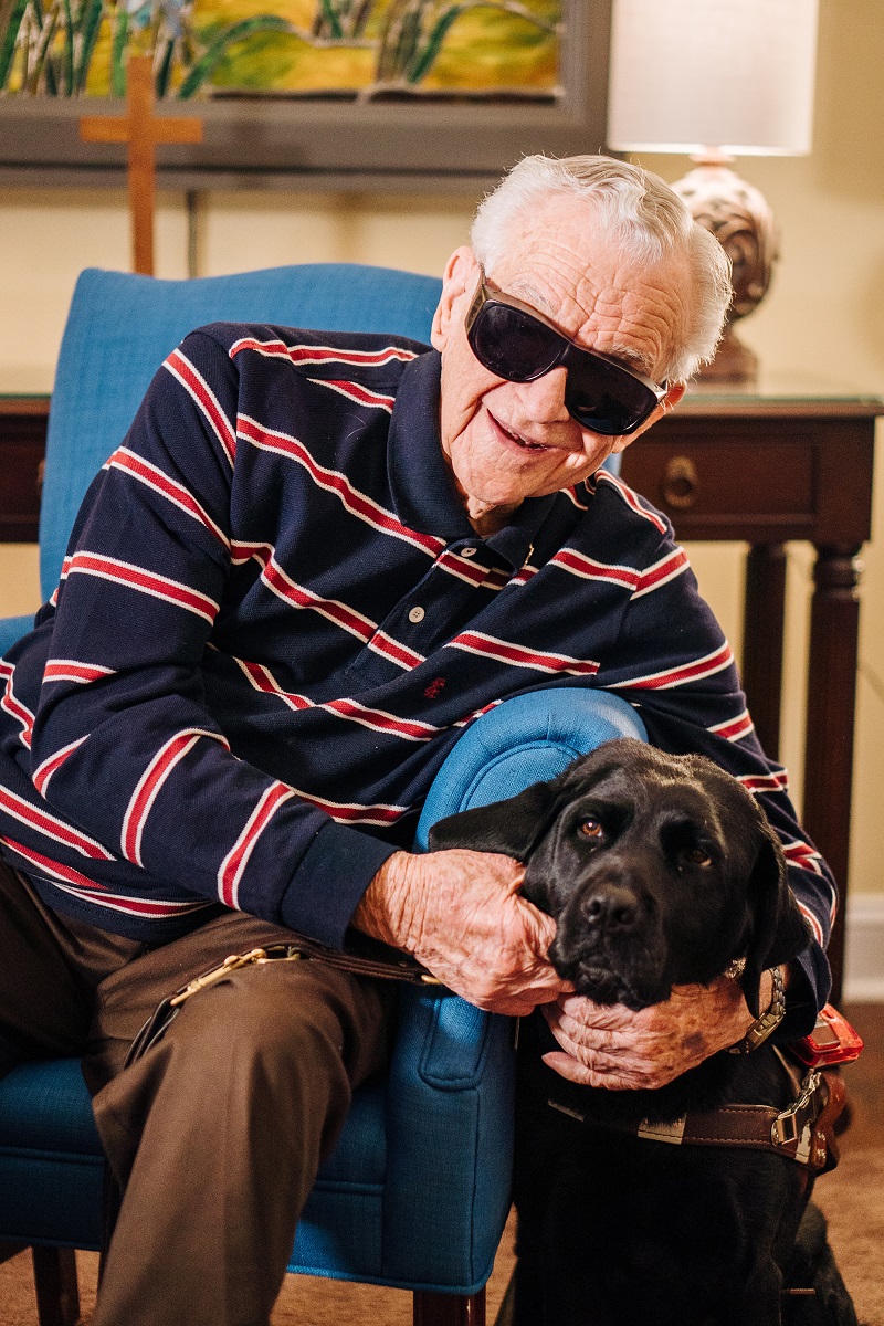Blind man with dog