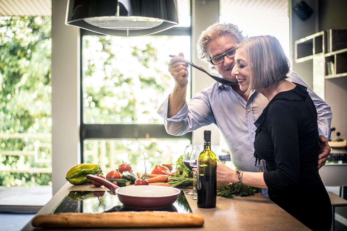 senior couple cooking together in the kitchen