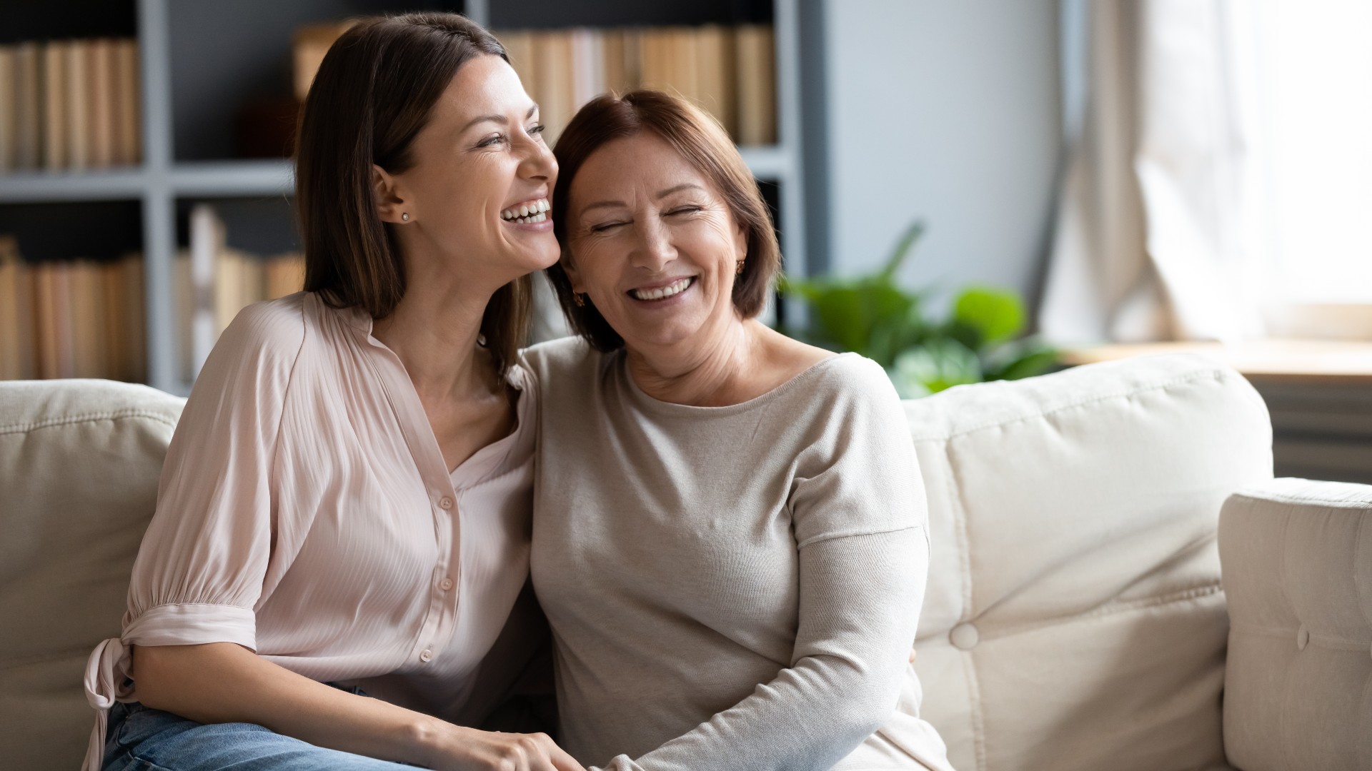 senior mother with adult daughter