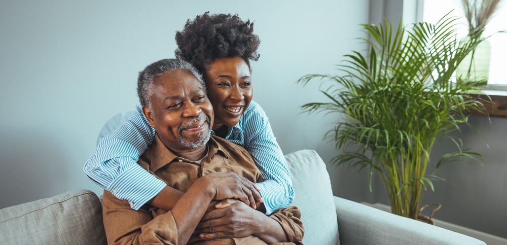 adult daughter visits senior father
