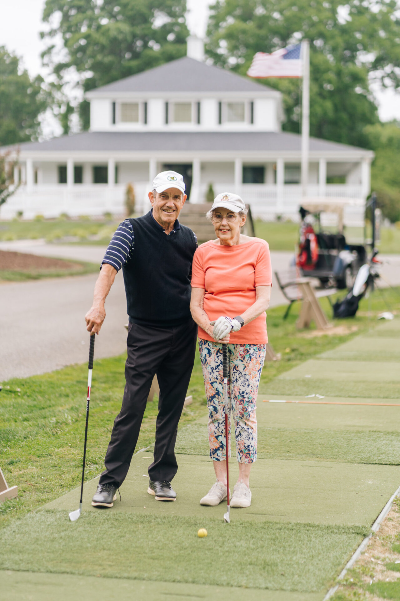 Adults golfing