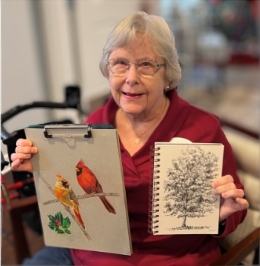 Artist with drawings