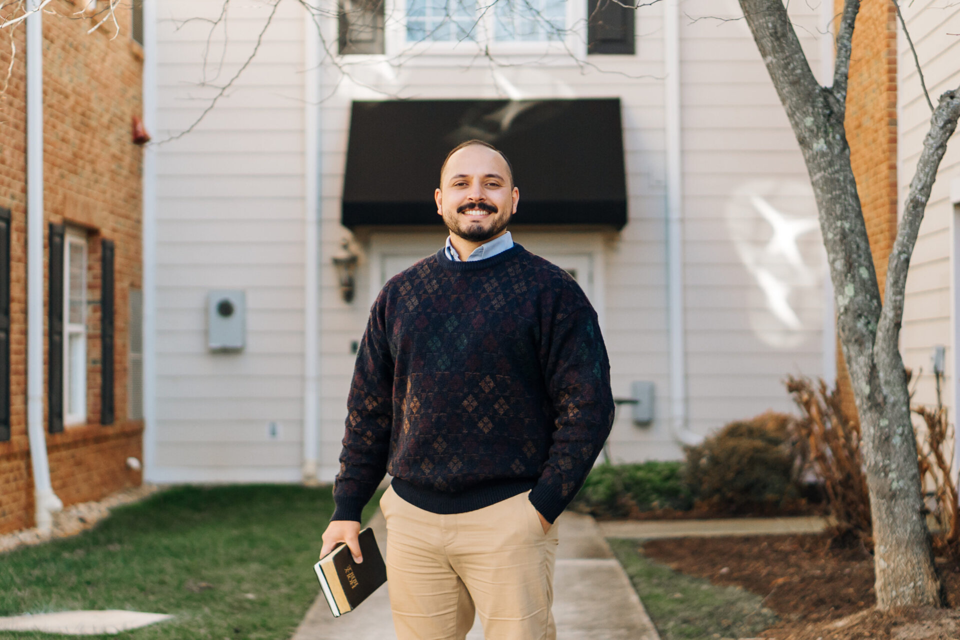Young adult with bible