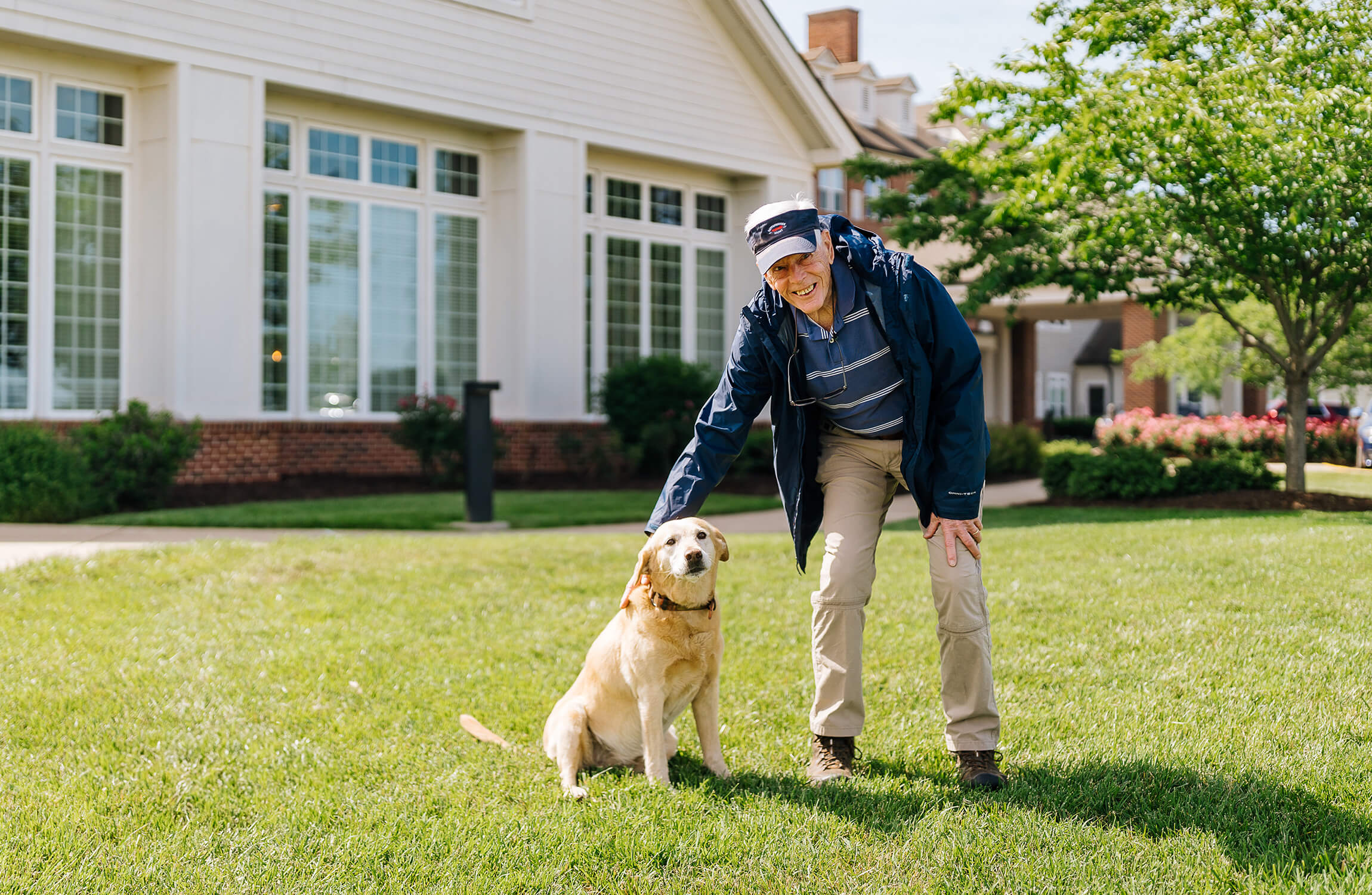 Culpeper senior pets dog in yard
