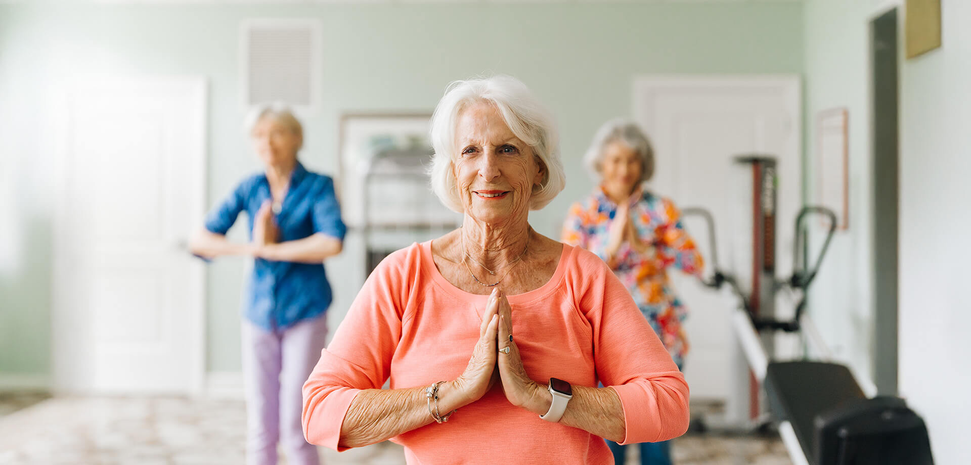 Seniors doing yoga pose
