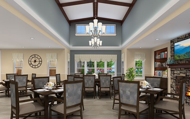 Elegant Dining Space in Community Center Dining area with tables, chairs, large windows, fireplace, and chandeliers.