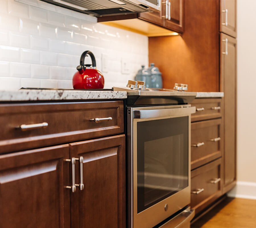 Close up view of a unit's kitchen showing the oven