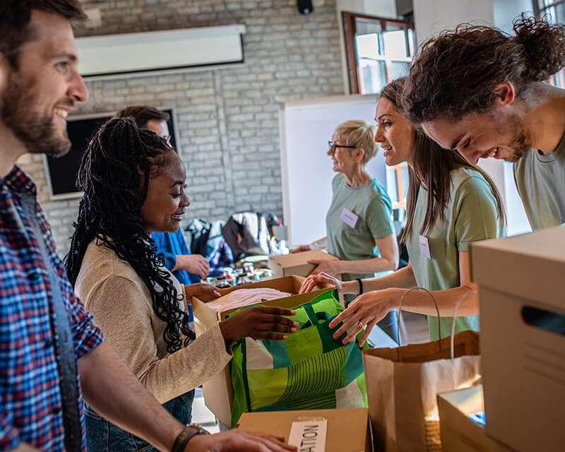 volunteers packing up boxes