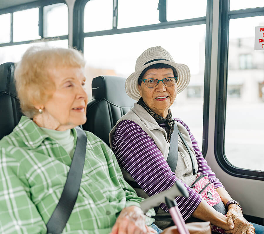 Two senior women riding The Summit bus