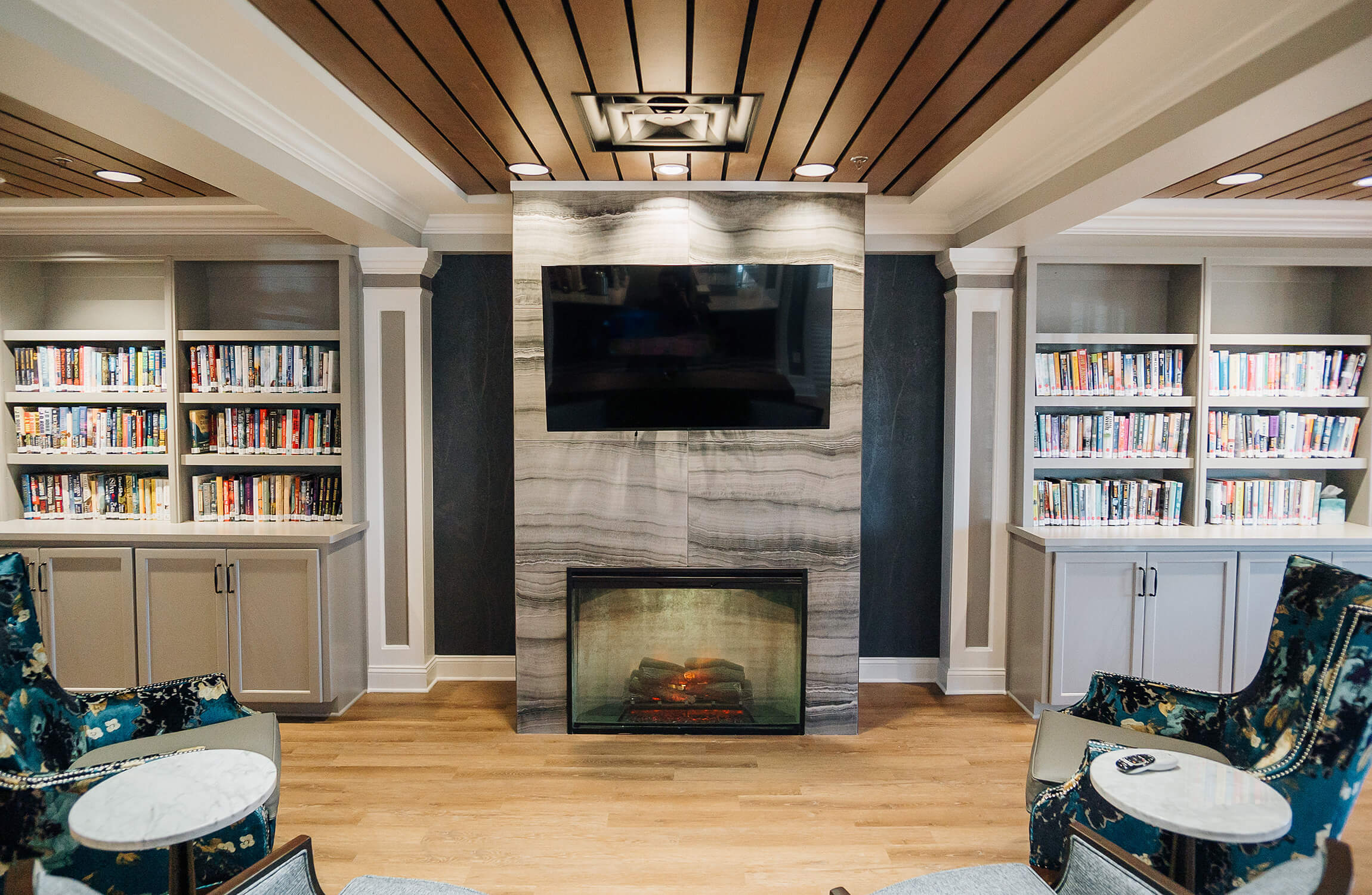 The Summit community space with comfortable seating and a library