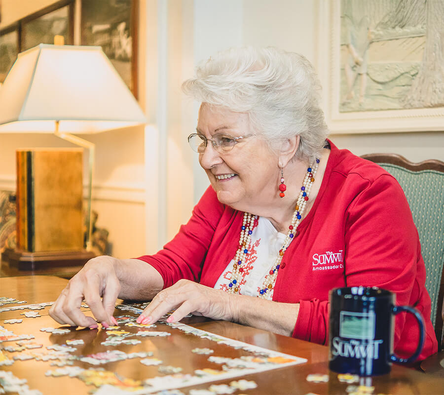 Senior woman doing a puzzle