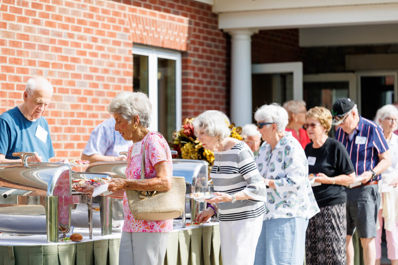buffett-dining-event (1) Seniors in line for buffet at an outdoor event