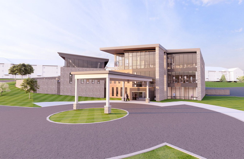 Modern three-story building with large windows in a senior living community.