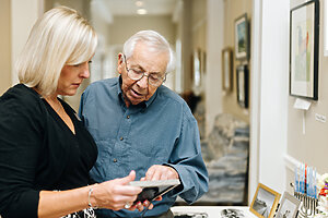 Ted Brenig and woman speaking