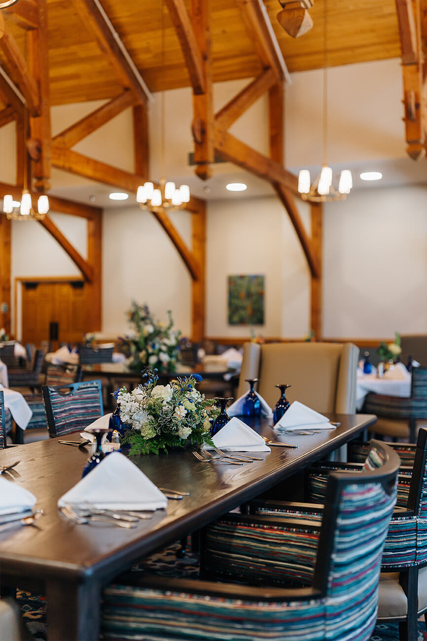 The Glebe dining space with rustic details and elegant set tables