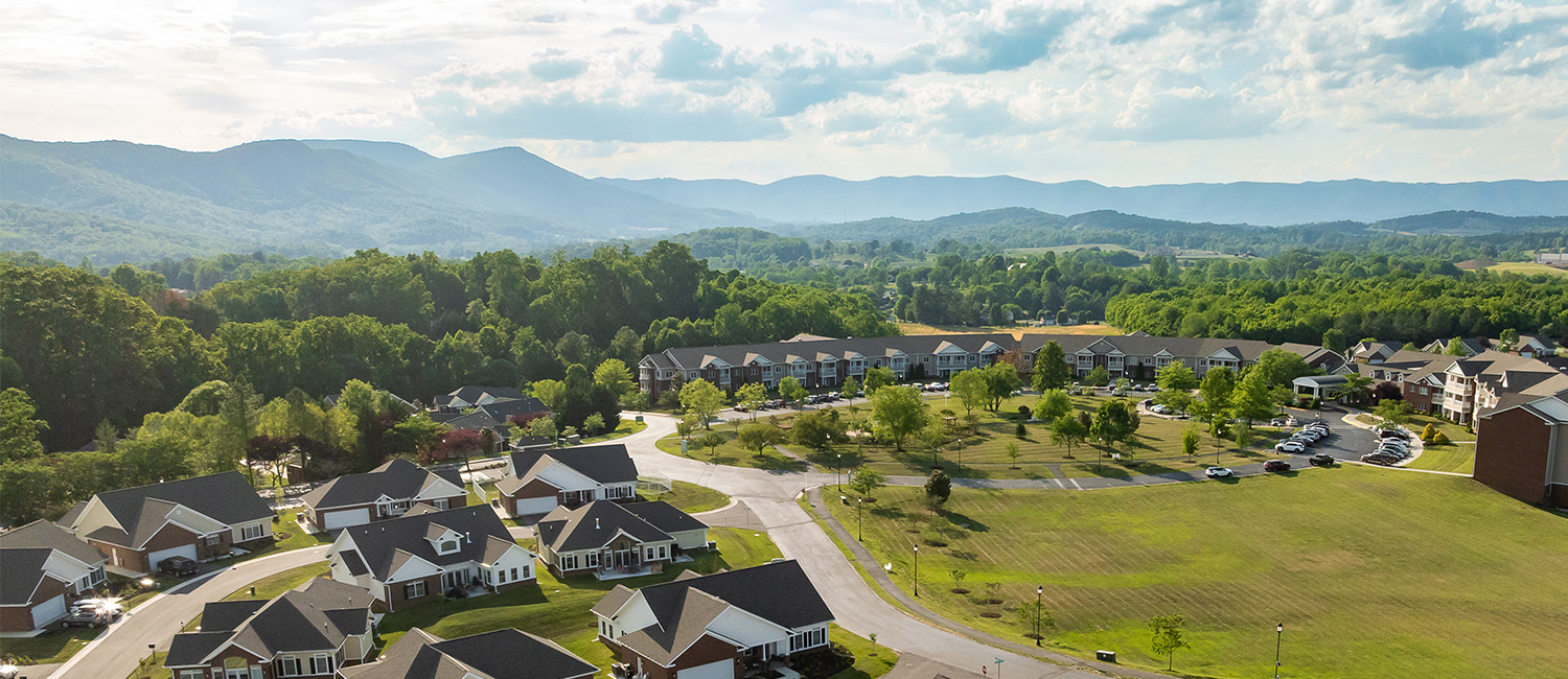 The Glebe residences near scenic mountain range