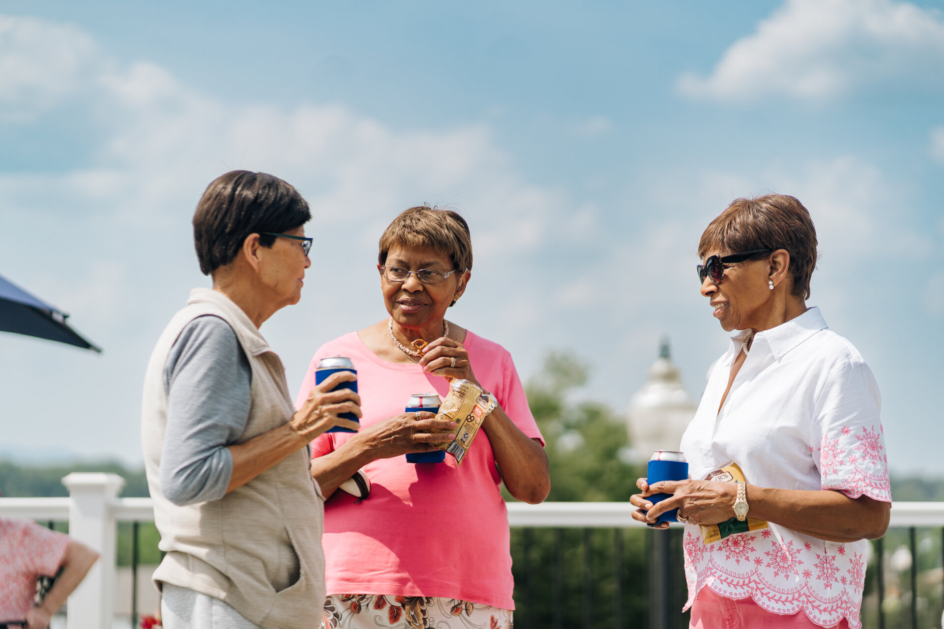 Senior women talking at an event