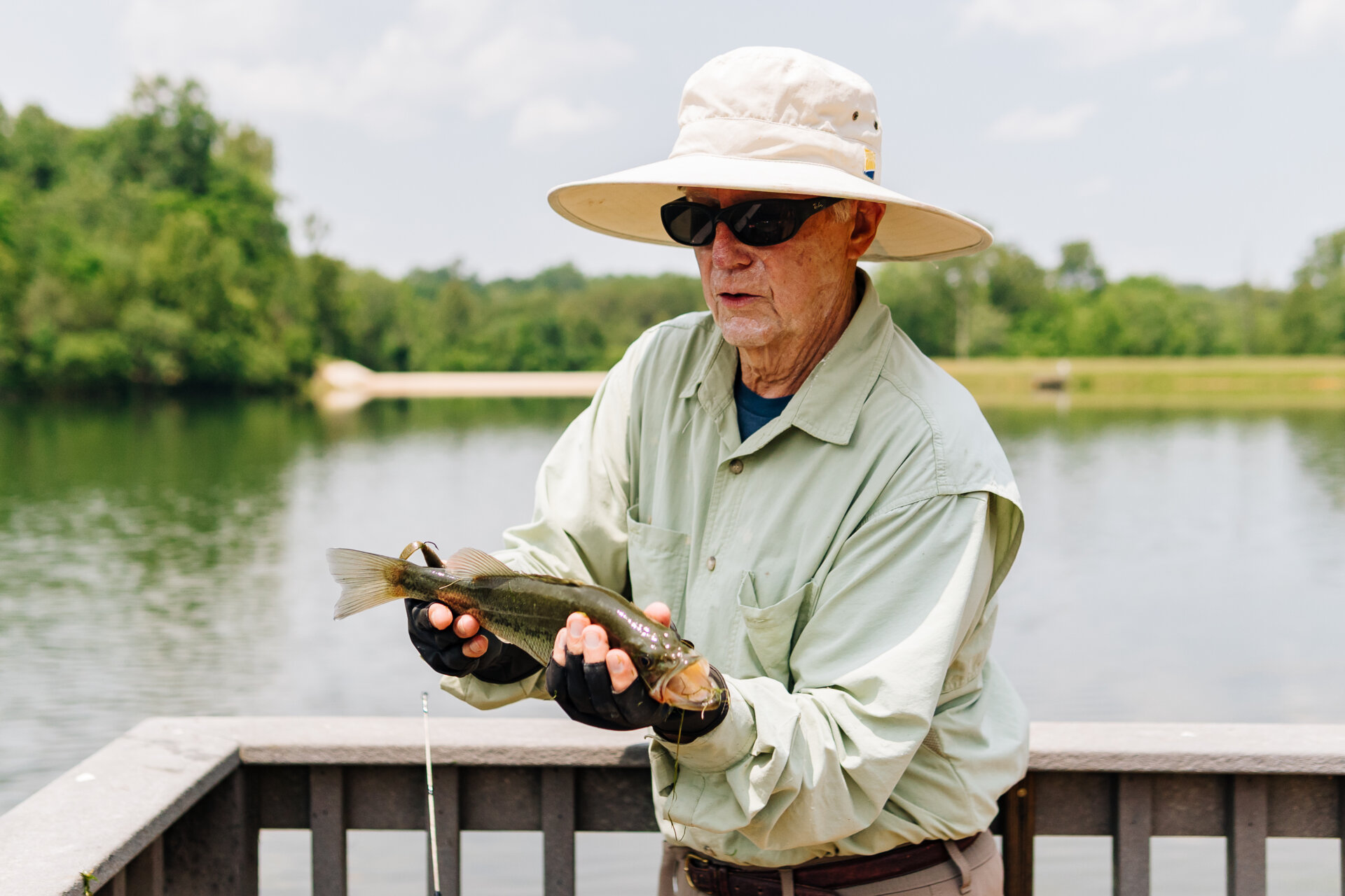 Senior man holding a fish