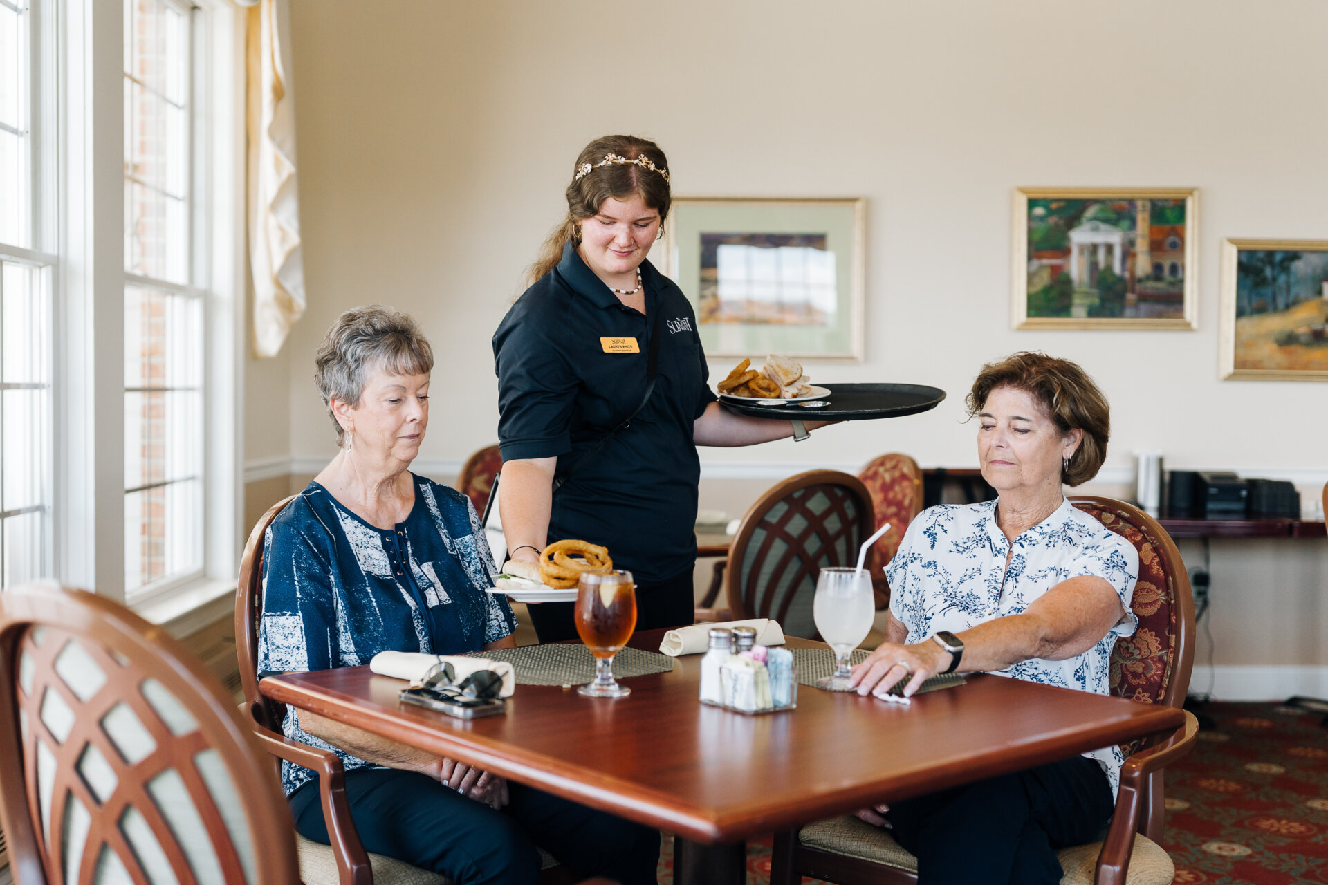 Waitress serving food